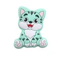 Detailed view of mint green cartoon cat silicone bead for DIY baby teething pacifier clips - Green