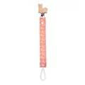 Detail of baby pacifier clip with beech wood llama carving and orange leaf pattern strap - Fox Clip Orange Leaf
