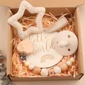 Infant gift set with beech wood star teether, pacifier clip and soft bow headband in a box - Beige