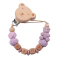 Detail of wooden bear clip pacifier chain with purple beads and BABY letter cubes - Purple