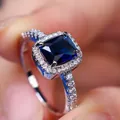 Luxurious rectangular deep blue sapphire halo ring in polished white gold plating - Size 5 / White Gold Sapphire Blue