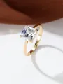 Detailed macro view of a four-prong princess cut square zircon ring in gold finish - US 6 / Rose Gold/White Zirconia