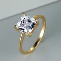 Elegant gold ring featuring a princess cut white zircon in a classic four-prong setting - US 5 / Gold with White Stone