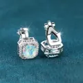 Silver clip-on earrings featuring round opal stones with a sparkling zircon halo - Platinum White Opal