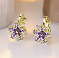 Elegant gold flower earrings with purple marquise gemstones and white diamond accents - Gold Plated Purple Zircon