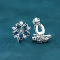 Zilveren bloem clip oorringen met donkerblauwe edelstenen en witte diamant accenten - Platina Verguld Koningsblauw