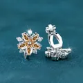 Elegante amberkleurige bloem clip-on oorbellen met witte zirkonia in zilveren finish - Gerhodineerd Champagne