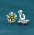 Elegant flower ear clips with green teardrop stones and white crystals in silver finish - Platinum Olive Green