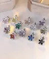 Sparkling flower-shaped pendants in various colors with zircon and silver finish - White Gold Multicolor