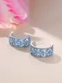 Boucles d'oreilles créoles C en argent avec pierres bleu clair marquises en serti micro - Plaqué Platine Bleu Aqua
