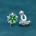 Green snowflake clip-on earrings with emerald zircon and silver finish stones - White Gold Emerald