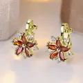Elegant gold earrings with red marquise stone petals and white diamond accents - Gold Base Garnet Red Stone