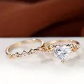 Tweeledige roségouden ringenset met hartvormige zirkoon en elegante bladmotieven - Maat 6 / 2-delige Set (R00210) / Champagnegoud Met Witte Zirkoon
