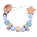 Star engraved beechwood baby pacifier clip with light blue silicone and crochet beads - Blue