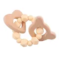 Baby teething ring with wooden bear head and soft pink silicone beads for gum relief - Nude