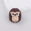 Detailed view of a brown silicone hedgehog bead with 3D texture for DIY crafts - Brown