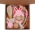 Newborn gift set with pink bunny teether, pacifier chain, and hairbrush in a kraft box - Pink