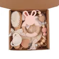 Newborn gift set with wooden brush, pink bunny teether, and handmade pacifier clip - Light Pink