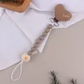 Detail of baby pacifier clip with brown heart fabric, silicone beads and lucky embroidery - Dark Taupe