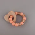 Beech wood heart baby teether ring with pink silicone beads and wooden blocks - Pink