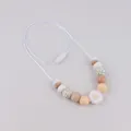 Daisy silicone teething necklace for baby with wooden beads and floral accents - White Daisy Style