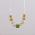 Silicone teething necklace for nursing moms with mustard yellow and floral beads - Avocado Green