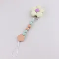 Baby Schnullerkette mit gelber Stoffblume und hellgrünen Silikonperlen aus Holz und Stoff - Hellgrün