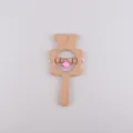 Handcrafted beech wood baby rattle in bear shape with wooden beads and a pink bell - Pink