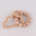 Natural beech wood teething toy set featuring a cloud-shaped ring and wooden beads - Cloud