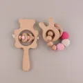 Pink silicone and beech wood baby rattle set with bear and bunny teething rings - Rabbit