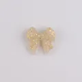 Bow-shaped silicone bead accessory with golden foil flakes for baby teething jewelry - Yellow