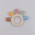 Anneau de dentition bébé en silicone avec cinq embouts texturés pour soulager les gencives - Coloré