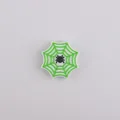 Green spider web silicone bead for DIY pens and accessories with black spider design - Green