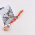 Silicone baby pacifier clip with gingerbread man charm and red beads for Christmas - Gingerbread Man
