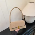 Chic beige leather underarm bag with vintage texture and gold buckle for women - Khaki