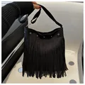 Bohemian black faux suede tote bag featuring long fringes and adjustable shoulder strap - Black