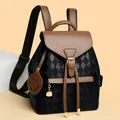 Women's plaid backpack in black and brown bicolor design with gold hardware - Coffee