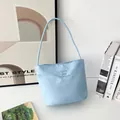 Detail of light blue nylon bag with Love and Fearless embroidery in a stylish interior - S / Lettered Style (Thickened Bottom) / Light Blue
