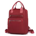 Zaino trapuntato in nylon rosso scuro con doppi manici e tasche con cerniera - Rosso