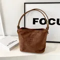 Brown suede bucket bag with decorative lettering and knot handles for women - Matte Brown