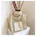 Detail of beige woven straw tote bag with square linen front pocket and long straps - Small / Cream White Small