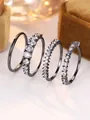 Detail of four-piece black plated ring set with various shaped clear zirconia crystals - US 5 / Black Gold (White Cubic Zirconia)