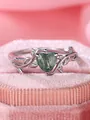 Macro detail of heart-shaped moss agate stone set in silver vine and leaf band ring - Platinum Heart Agate (US Size 6)