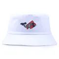 White canvas bucket hat featuring intricate colorful fish embroidery on the front - One Size / White
