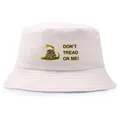 Cream cotton bucket hat featuring Gadsden Flag snake print and Don't Tread On Me text - Adult One Size (58cm Non-adjustable) / Beige