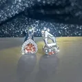 Boucle d'oreille clip cœur argentée avec zircone orange et sertissage halo pavé - Clip d'Oreille Cœur / Zircone Champagne