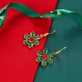 Christmas snowflake drop earrings in red and green enamel with golden holiday finish - Multicolor Snowflake