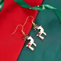 Christmas reindeer hook earrings with white enamel and golden antlers on festive background - Polka Dot Elk