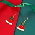 Festive Christmas bell drop earrings with green bow and golden hooks for holidays - Red and White Bell