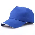 Royal blue cotton 5-panel baseball cap with white sandwich peak detail on a white background - Blue